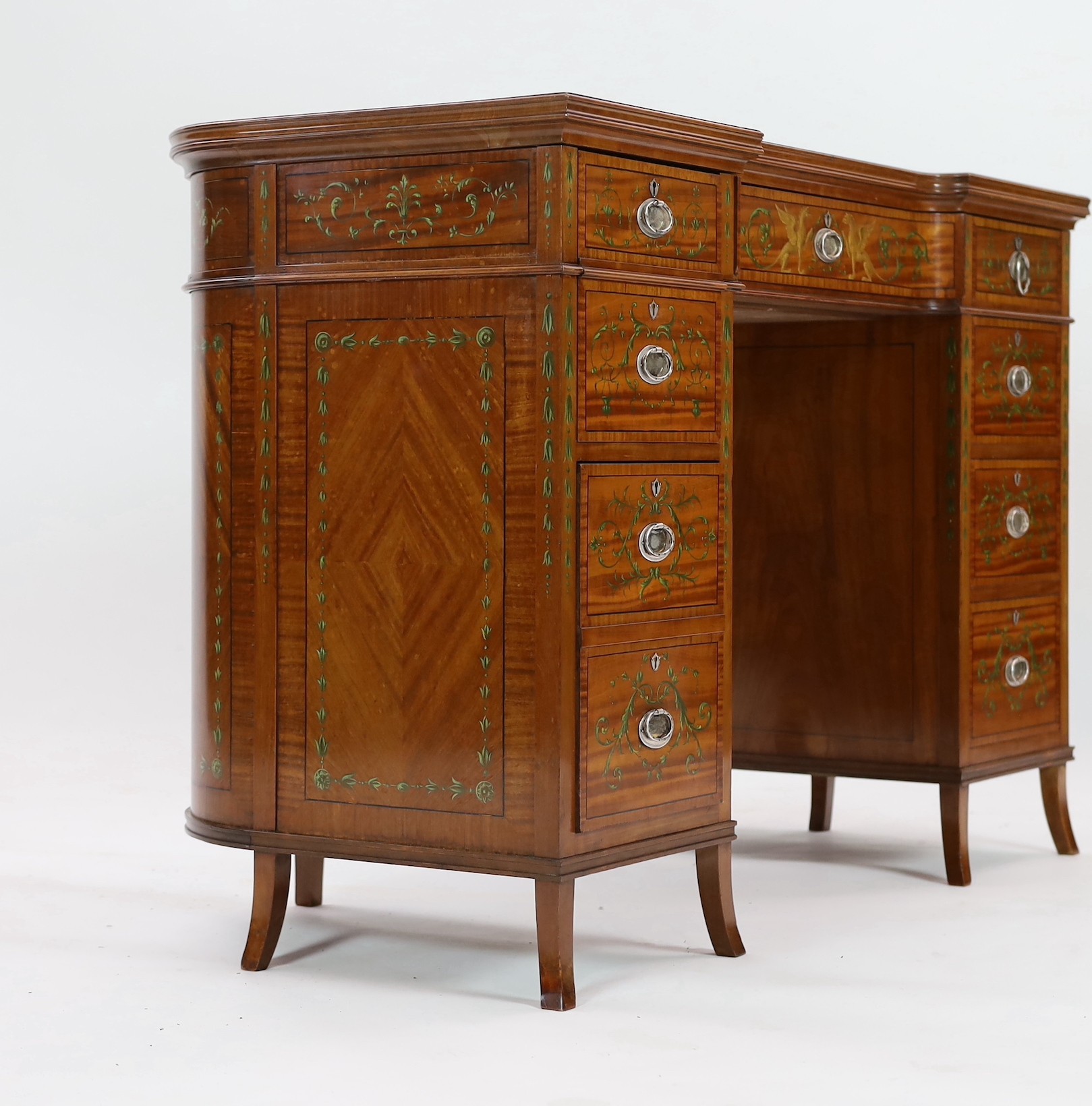 An Edwardian painted satinwood kneehole desk, W.110cm D.53cm H.75cm